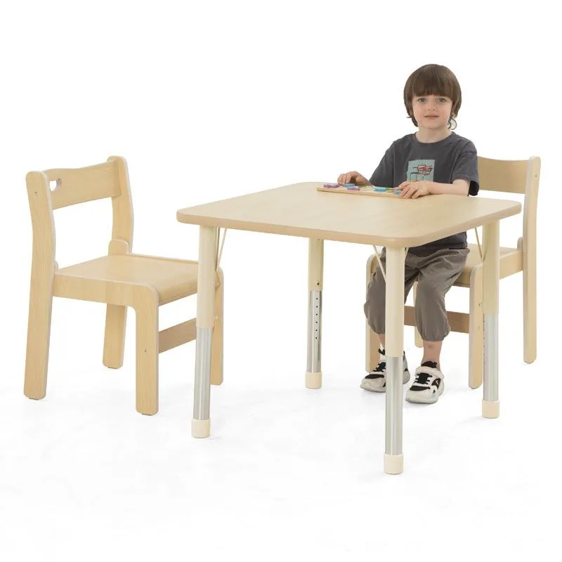 Square table Owlaf in beige with chair Ole and child at play Square table Owlaf in beige with chair Ole and child at play